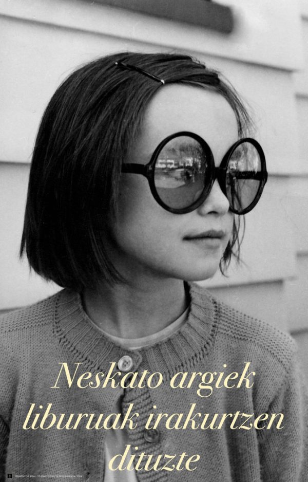 CARTEL NESKATO ARGIEK LIBURUAK IRAKURTZEN DITUZTE EUSKERA